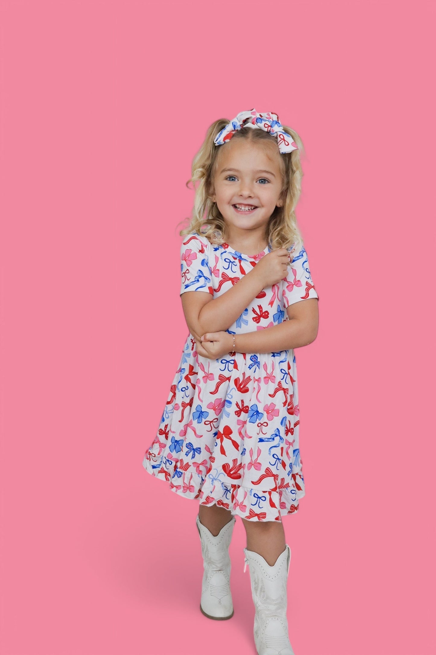 RED, WHITE AND BOWS DREAM RUFFLE DRESS