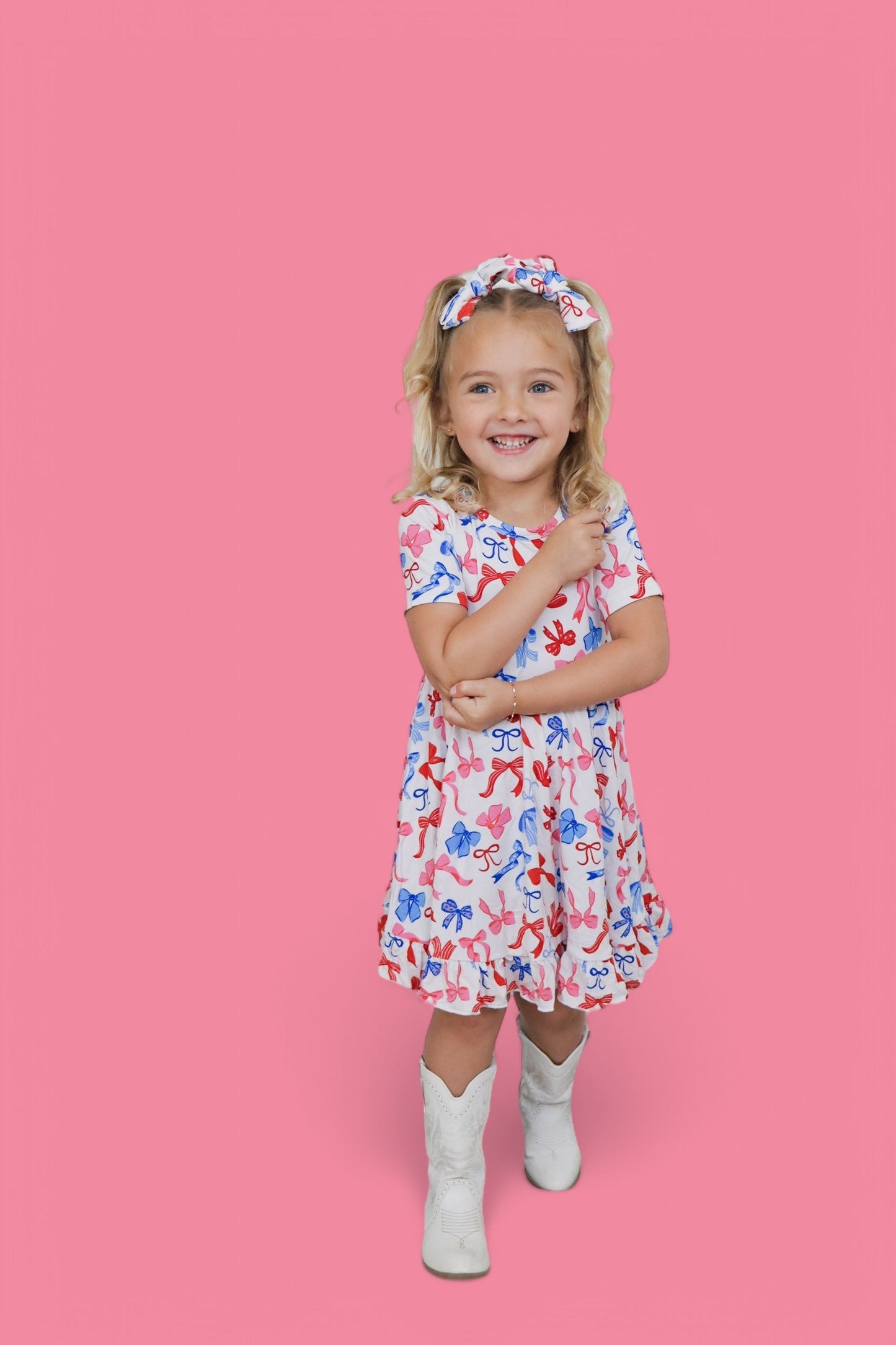 RED, WHITE AND BOWS DREAM RUFFLE DRESS