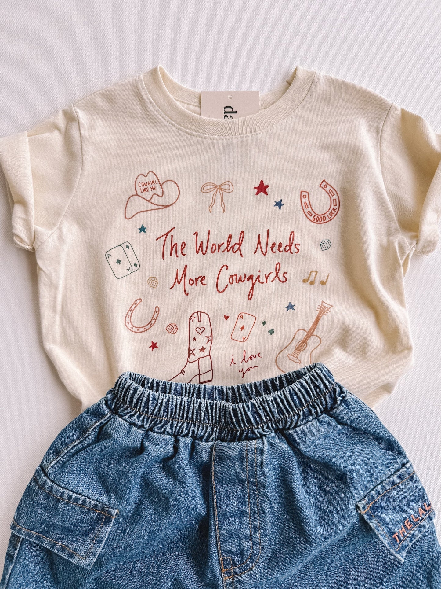 the world needs more cowgirls tee