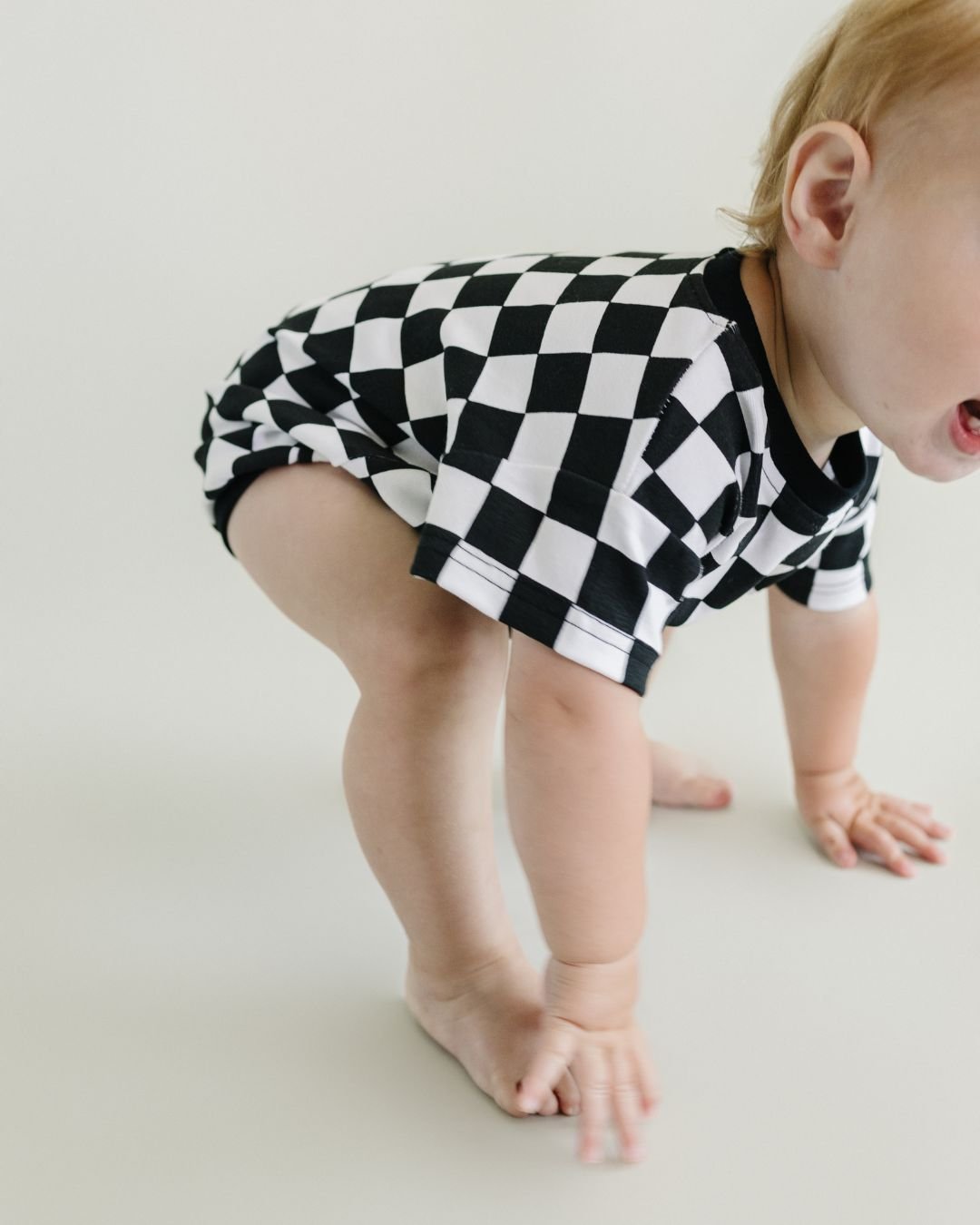 Short Sleeve Bubble Romper | Checkered Smiley Black - Mack & Harvie