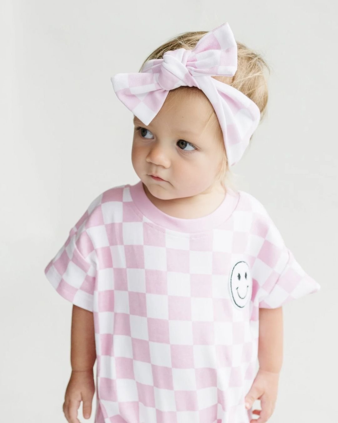 Short Sleeve Bubble Romper | Checkered Smiley Pink - Mack & Harvie