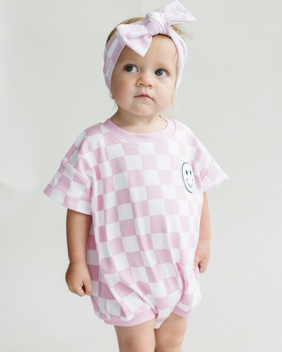 Short Sleeve Bubble Romper | Checkered Smiley Pink - Mack & Harvie
