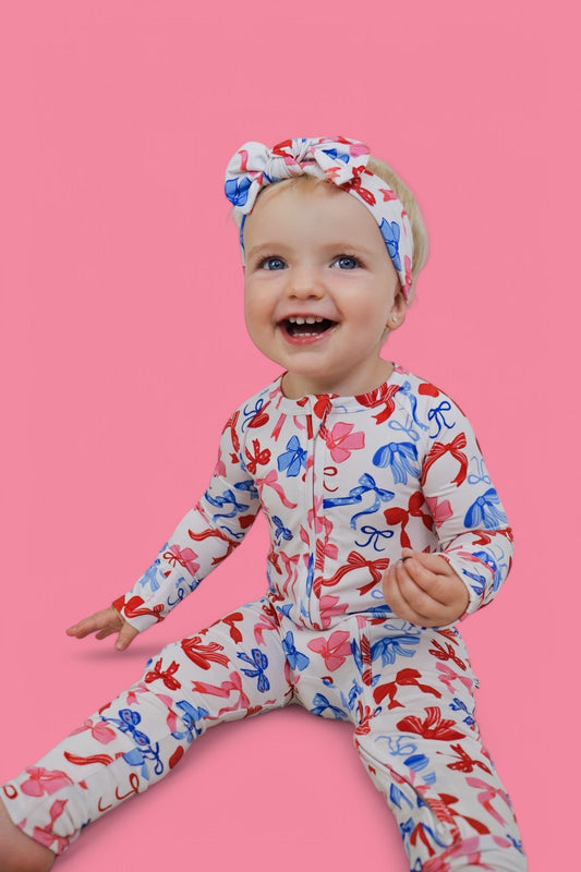 RED, WHITE AND BOWS DREAM ROMPER
