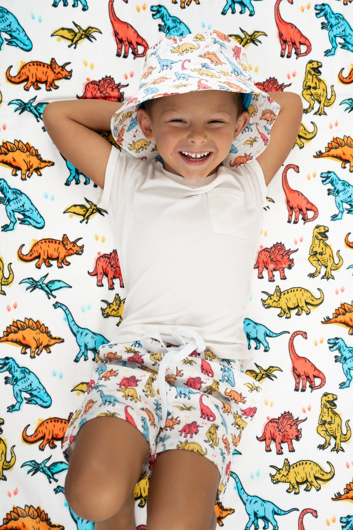 COLOR ME DINO DREAM SWIM TRUNKS