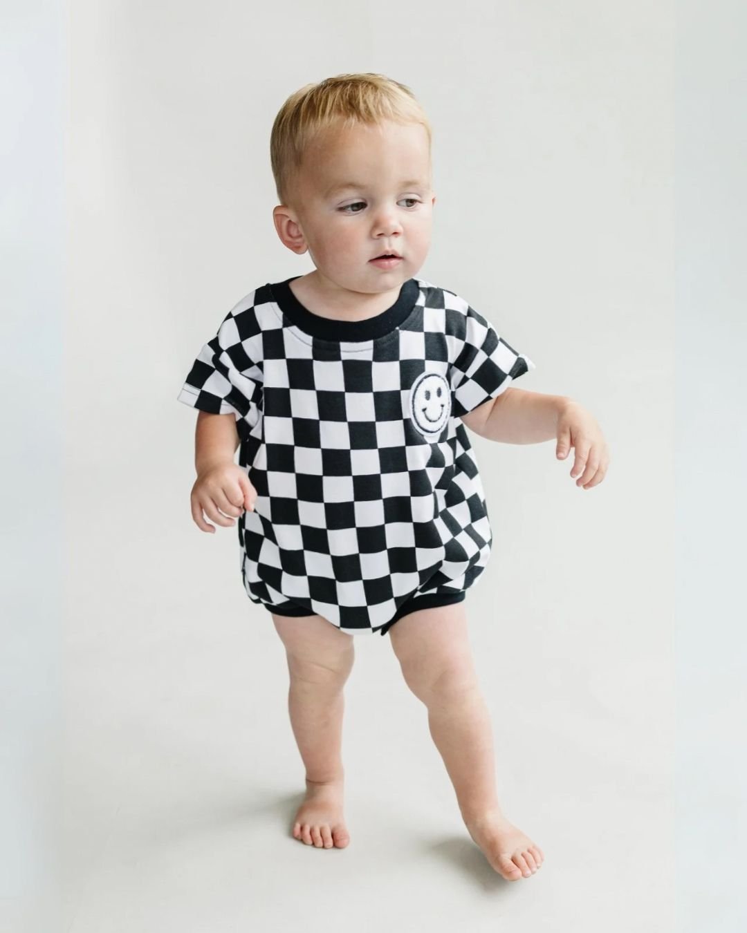 Short Sleeve Bubble Romper | Checkered Smiley Black - Mack & Harvie