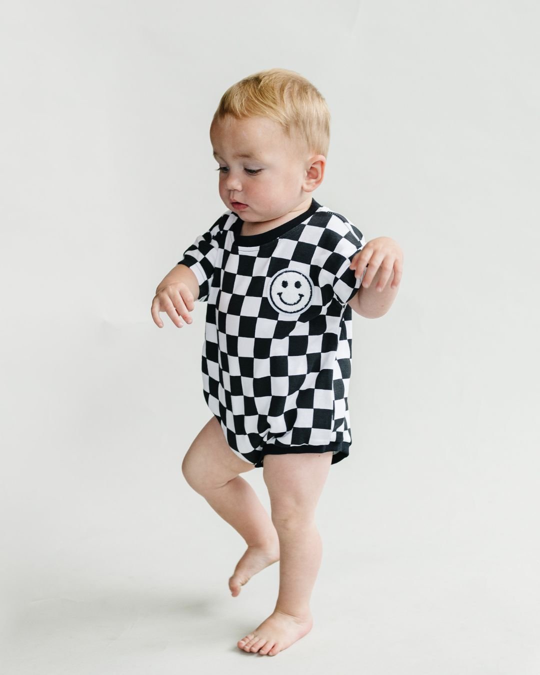 Short Sleeve Bubble Romper | Checkered Smiley Black - Mack & Harvie