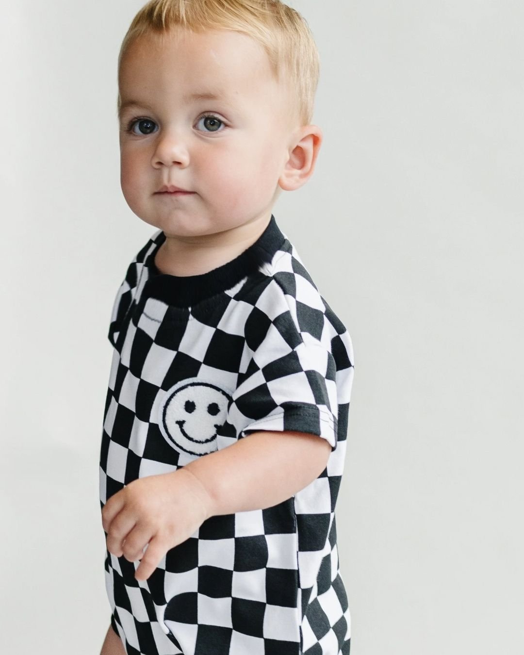 Short Sleeve Bubble Romper | Checkered Smiley Black - Mack & Harvie