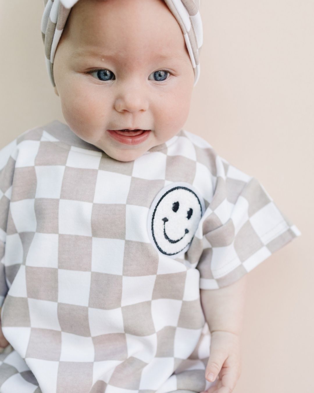 Short Sleeve Bubble Romper | Checkered Smiley Latte - Mack & Harvie