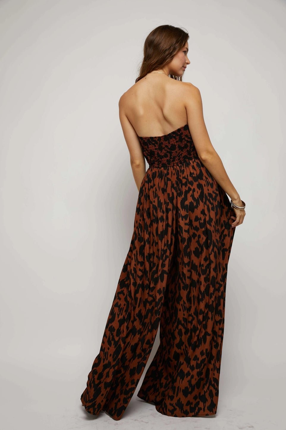 ANIMAL PRINT SMOCKED TUBE WIDE LEG JUMPSUIT - Mack & Harvie