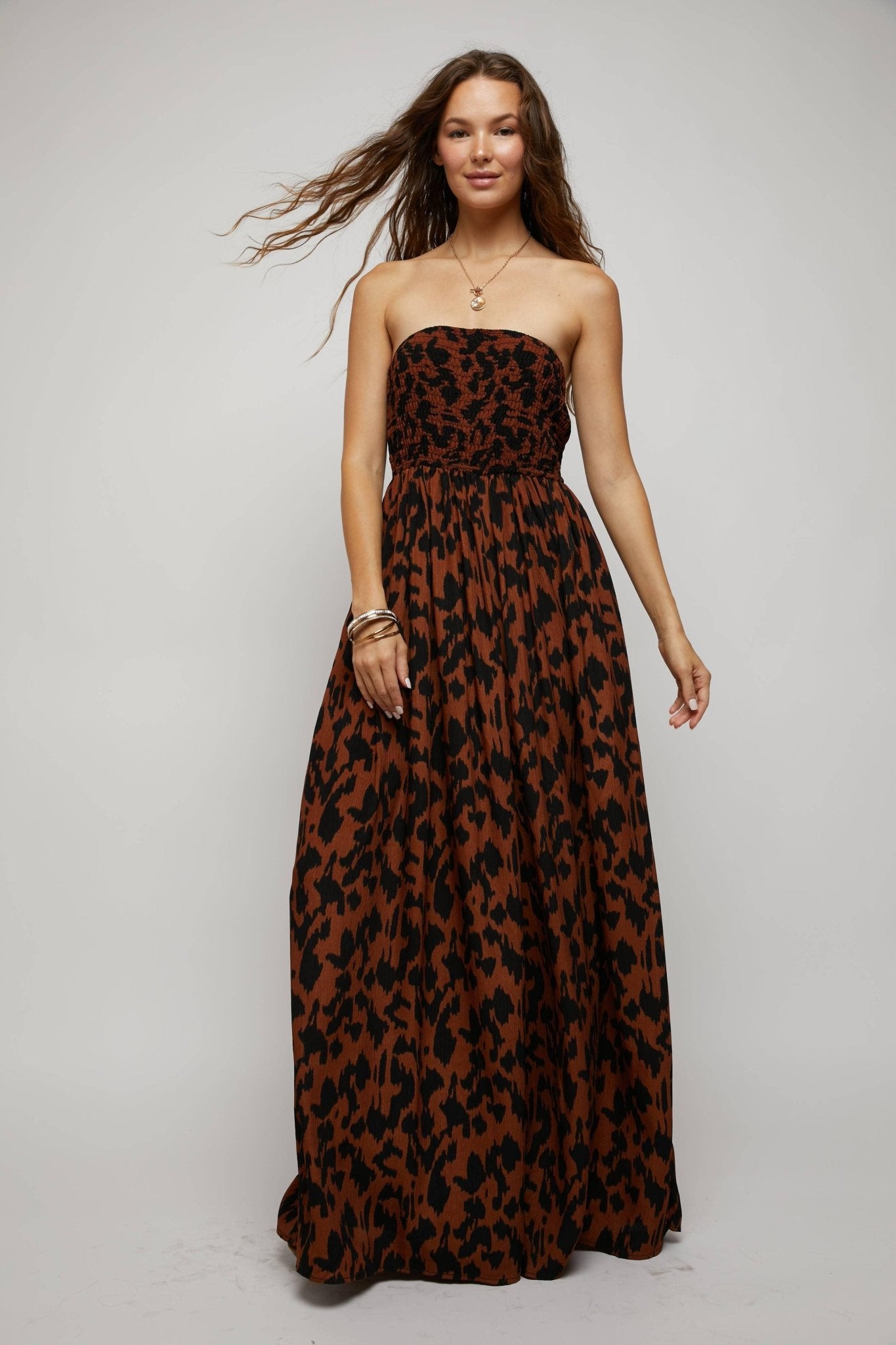 ANIMAL PRINT SMOCKED TUBE WIDE LEG JUMPSUIT - Mack & Harvie